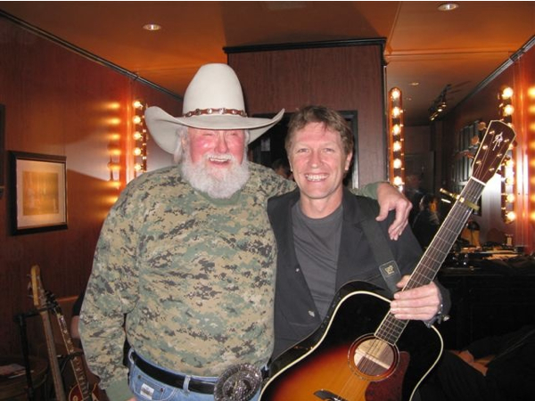 Recent Grand Ole Opry inductees, Charlie Daniels and Craig Morgan, pose backstage at the Grand Ole Opry. 