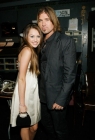 2008 CMA Award presenters Miley Cyrus and Billy Ray Cyrus